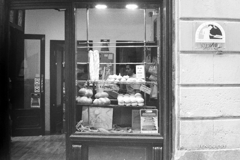 woman in window in barcelona shot with leica m3